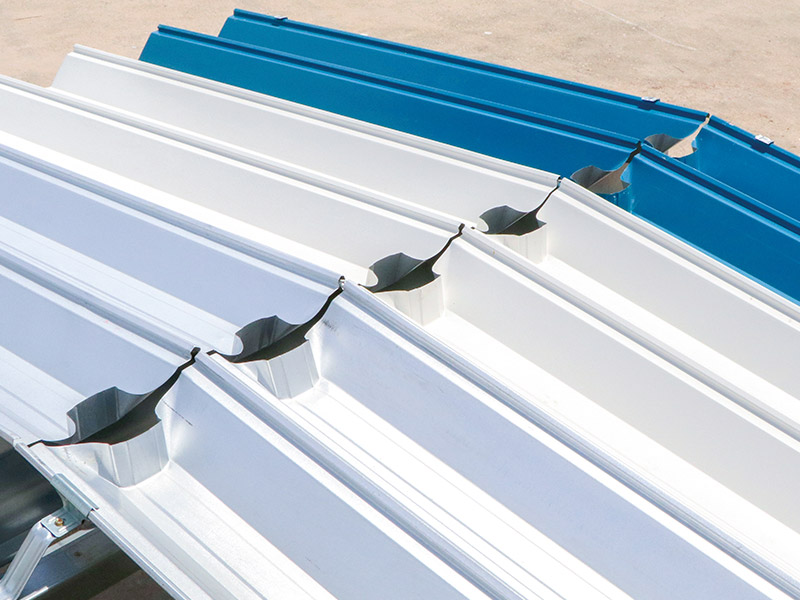 5. Fix roofing sheets. Turn up the tray of sheet at the ridge of roofing