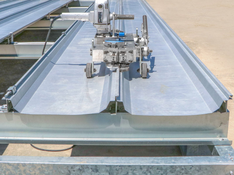 5.2 Seam Electric Seamer 180 at the edge of each roofing