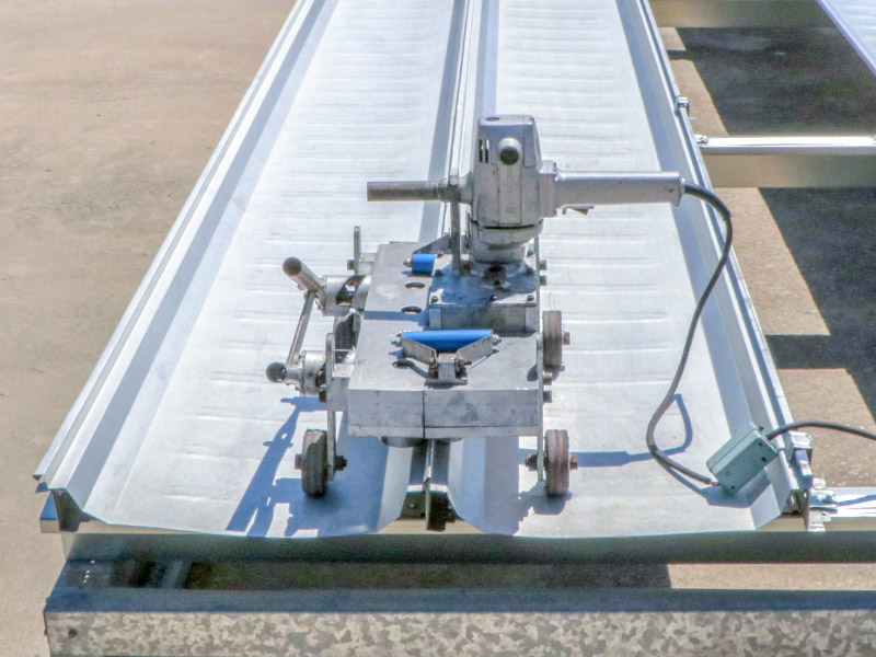 6.2 Seam Electric Seamer 360 at the edge of each roofing